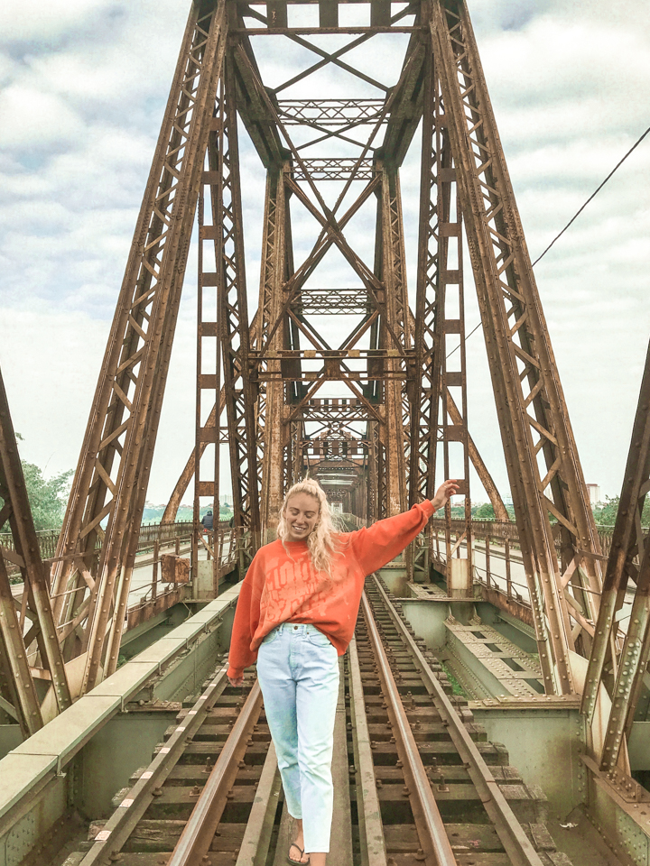 spellbound travels girl on bridge in hanoi 