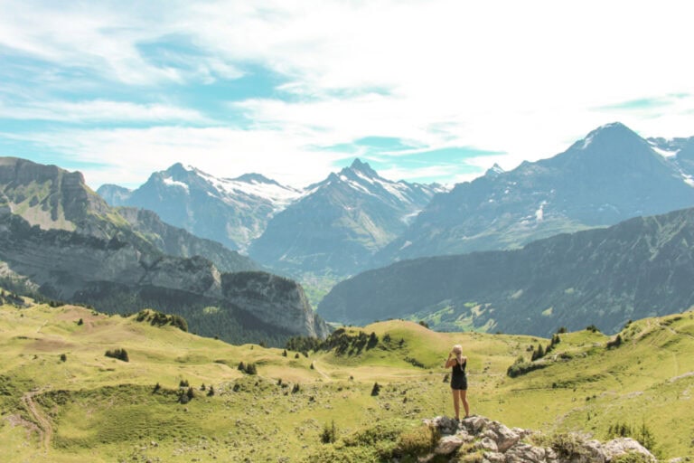 girl standing in the mountains in Switzerland